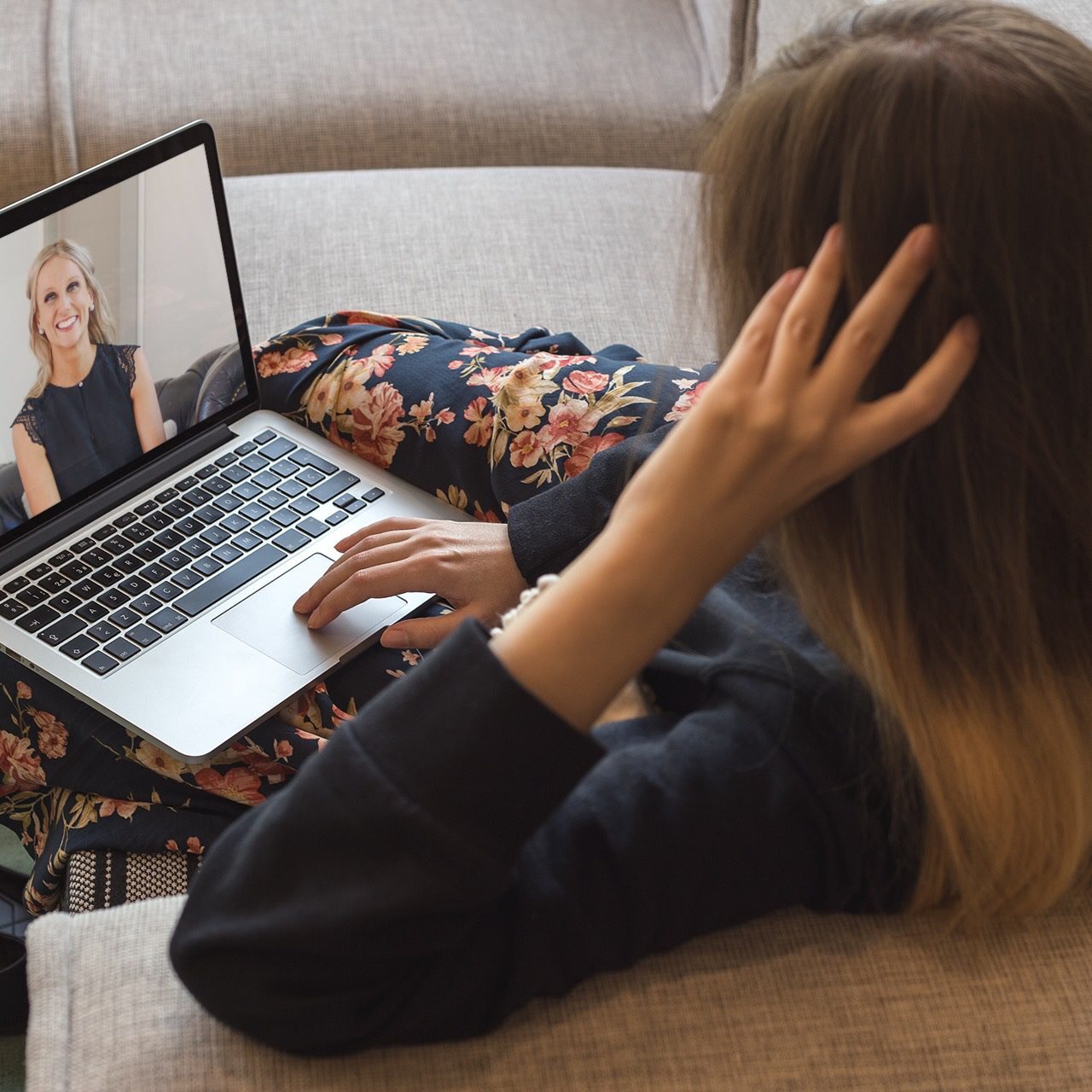 macbook-mockup-of-a-woman-working-on-a-sofa-a21507